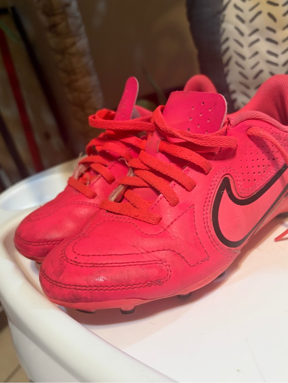 Nike Kids Bright Pink Soccer Cleats with Black Swoosh